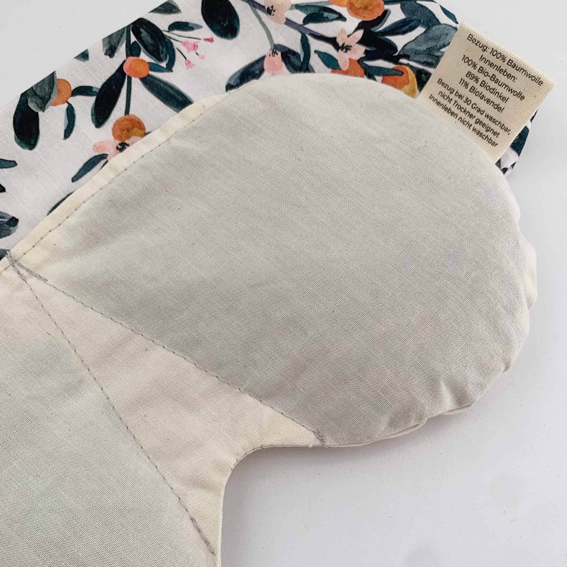 Orange/ sanddorn eyes cushion